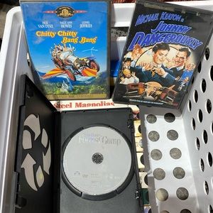 Three DVDs one does not have a case and that’s Forrest Gump